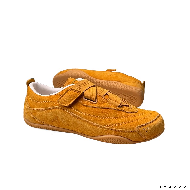 Adidas retro-style yellow sneakers.